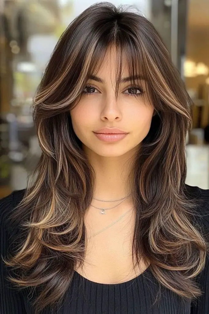 29 Stunning Butterfly Bangs Hairstyles 13 11. Sleek Butterfly Bangs: Polished and Refined