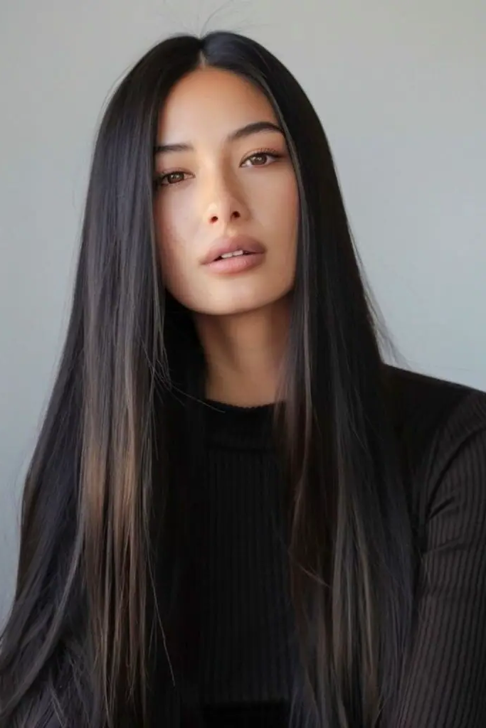 27 Gorgeous 2025 Haircuts for Women 15 13. Glossy Glass Hair