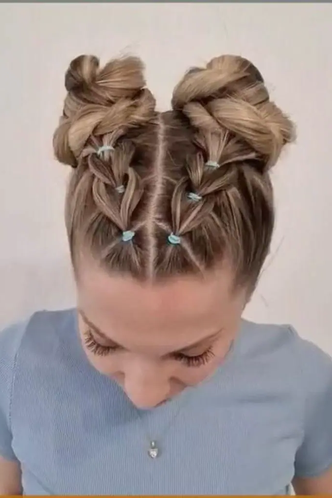 28 Elegant Softball Hairstyles 15 14. Space Buns with Braided Core