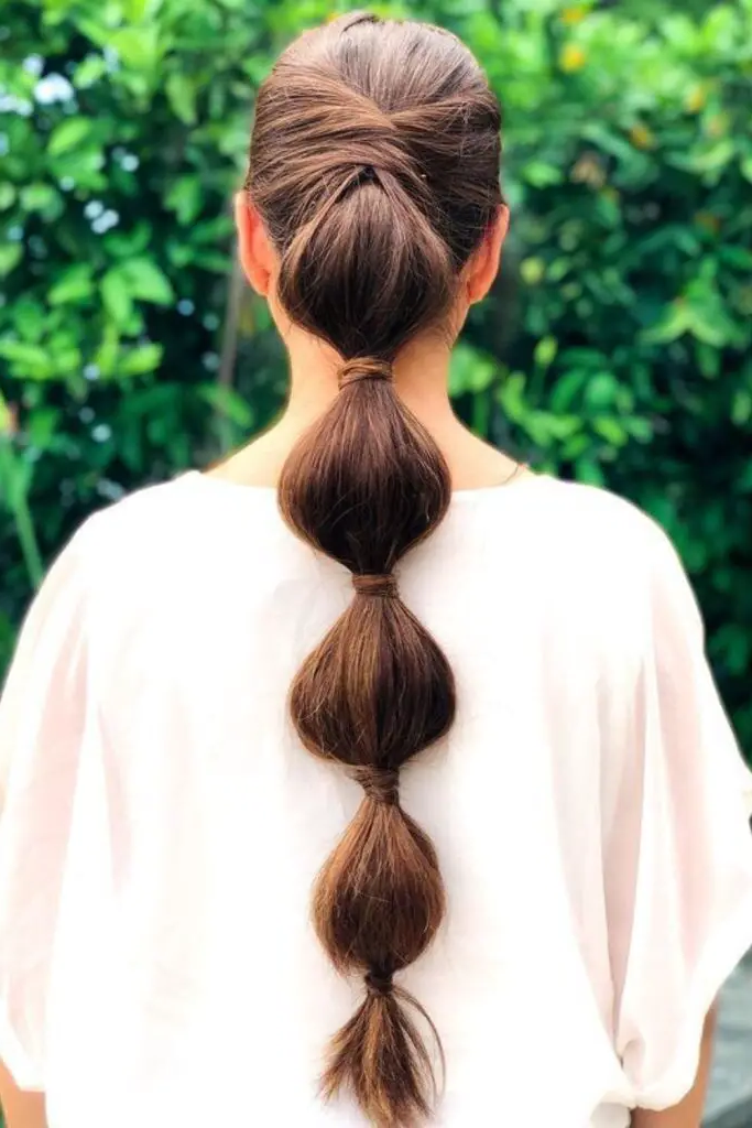 15. Playful Bubble Ponytail