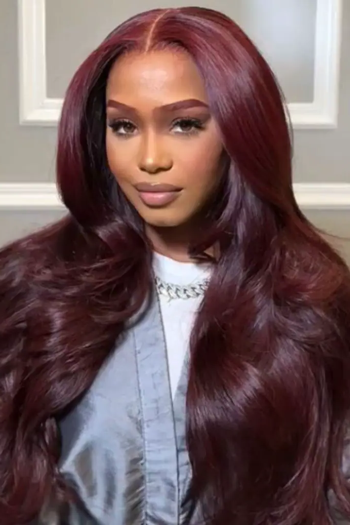 29 Best Black Baddies Hairstyles to Try 17 16. Bold Burgundy Layered Inches