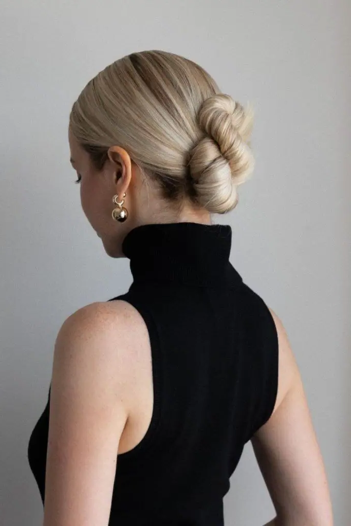 27 Stunning Turtle Neck Hairstyles 18 16. Low Chignon with Turtleneck Glam