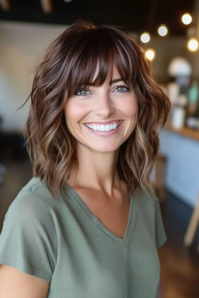 27 Best Lob Haircut with Bangs 17 16. Playful Pixie-Tipped Lob
