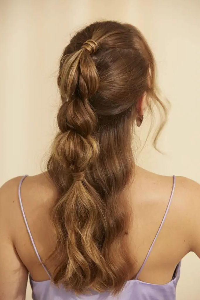 27 Simple Hairstyles for Long Hair 19 17. Half-Up Bubble Pony Chic