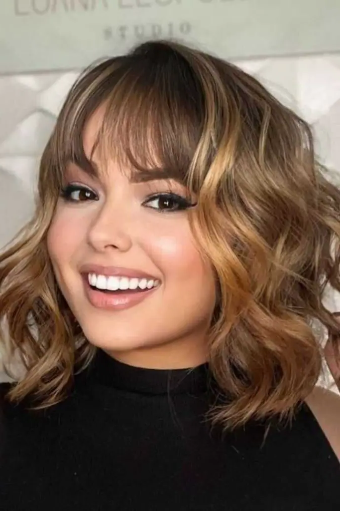 27 Gorgeous Haircuts for Round Chubby Faces 19 17. Layered Shaggy Lob with Bangs