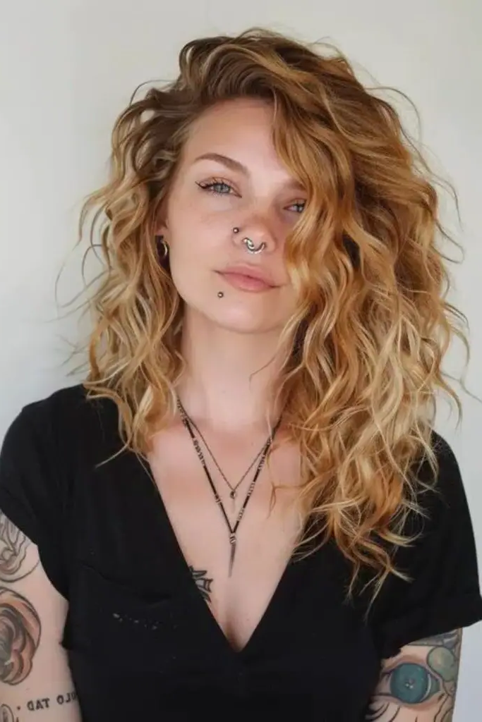 29 Wavy Layered Haircuts 19 18. Honey Drizzle Locks