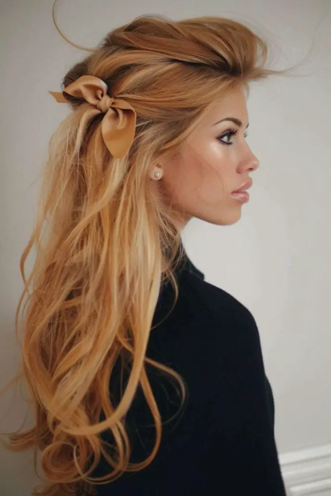 28 Cute Hairstyles with a Bow 20 18. Side Twist with Bow Adornment