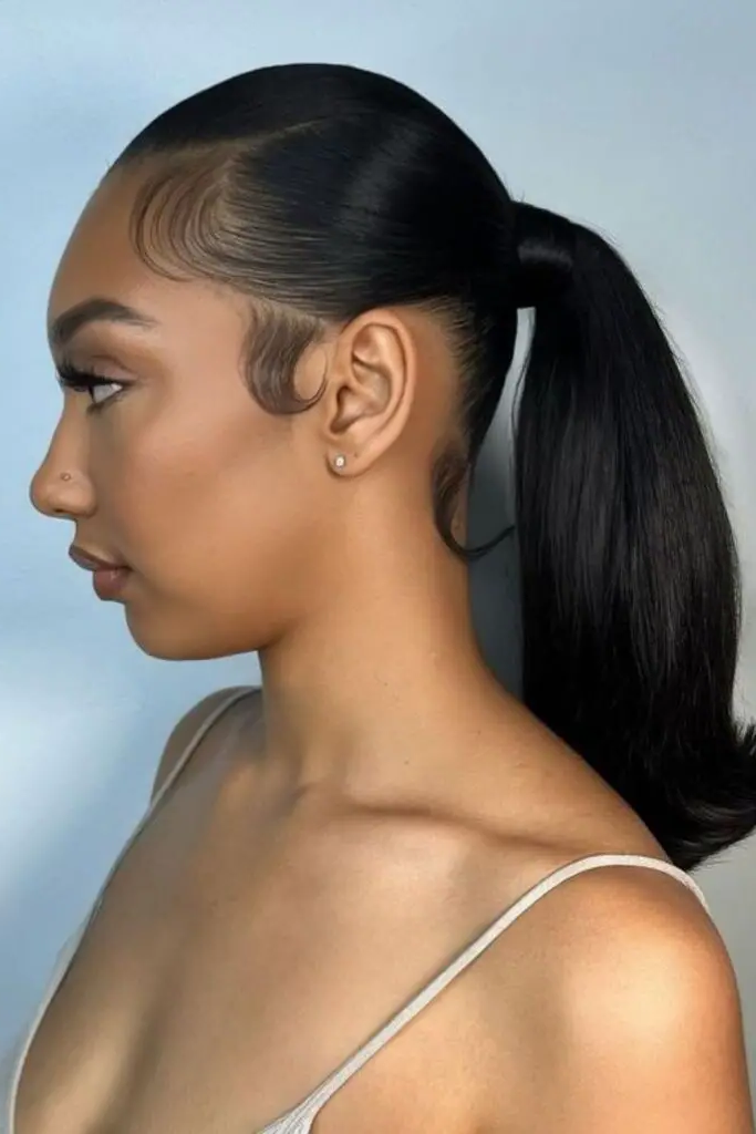 29 Best Black Baddies Hairstyles to Try 19 18. Slick-Backed Jet Black Precision