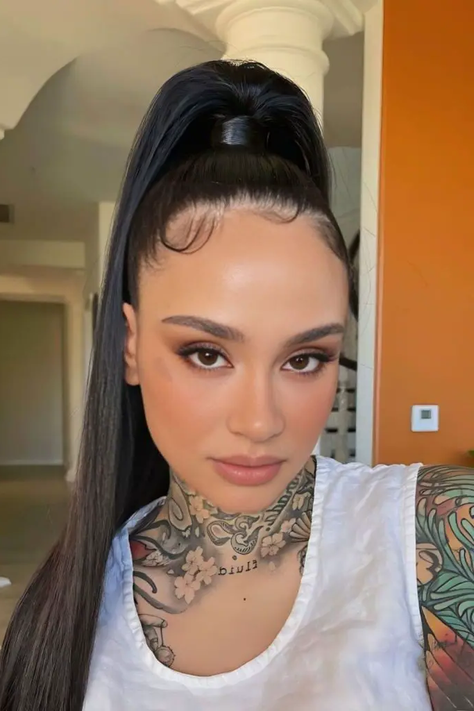 27 Easy Latina Hairstyles 4 2. High Ponytail with Wrapped Band