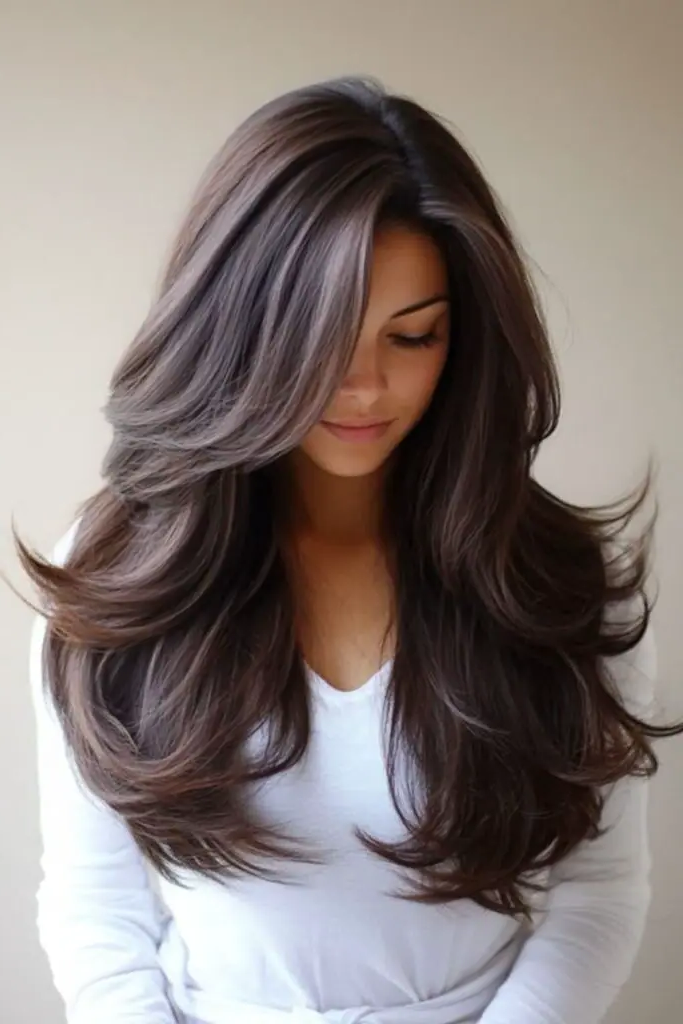 29 Wavy Layered Haircuts 4 2. Midnight Waterfall Layers