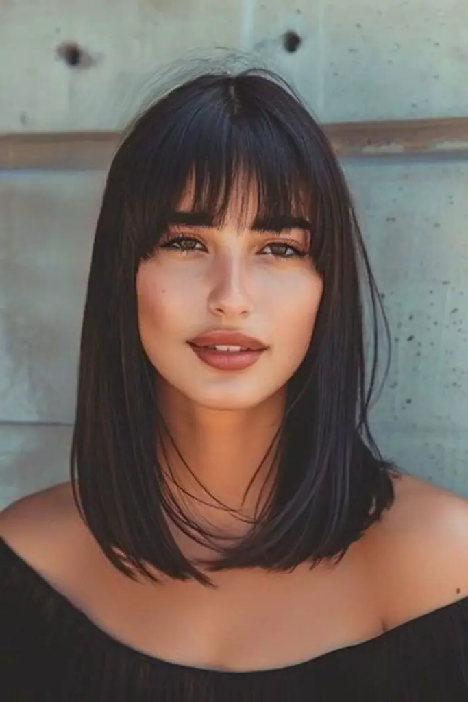 27 Best Lob Haircut with Bangs 4 2. Sleek Midnight Cascade