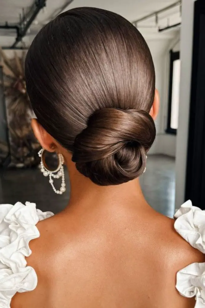 29 Cute Latina Hairstyles Long 23 21. Chic Twisted Low Bun