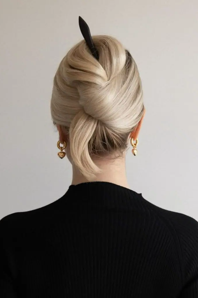 29 Cute Slick Hairstyles 24 22. Laser-Smooth French Twist