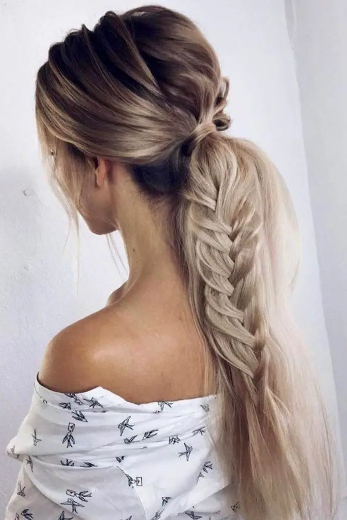 27 Simple Hairstyles for Long Hair 26 24. Braided Low Pony Perfection
