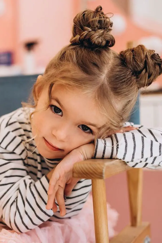 29 Cute Toddler Braids Hair Ideas 26 24. Twisty Space Buns