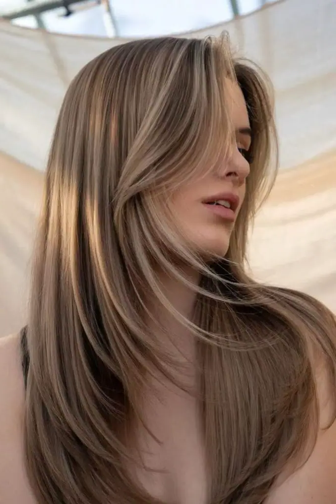 27 Long Layered Haircuts with Face Framing 26 25. Cascade of Fire