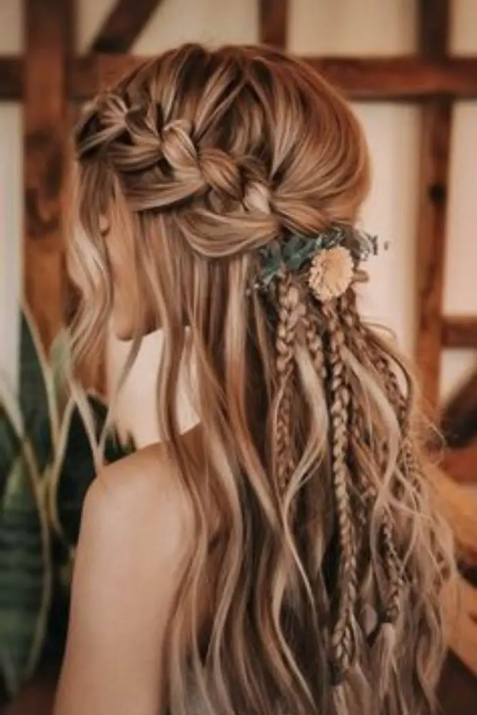 29 Top Spring Hairstyles for 2025 29 27.Bohemian Waves with Feathers