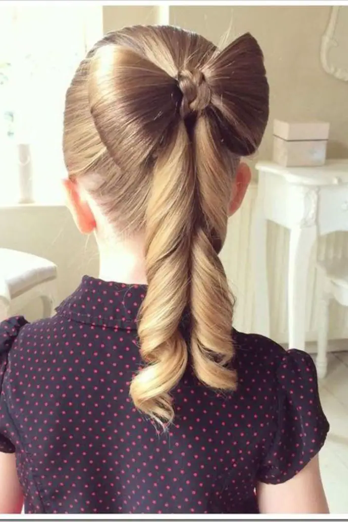 29 Cute Toddler Braids Hair Ideas 29 27. Braided Bow Accents