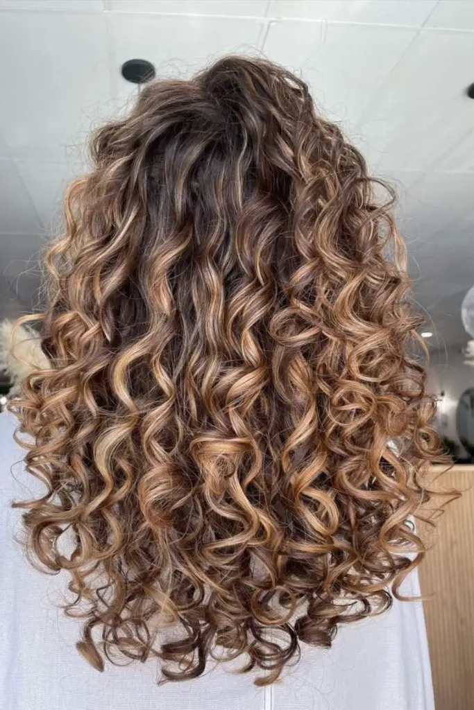 28. Silky Curls with a Pop of Color