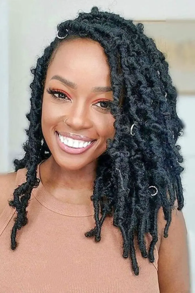 29 Best Black Baddies Hairstyles to Try 30 29. Loose-Knot Butterfly Locs Dream