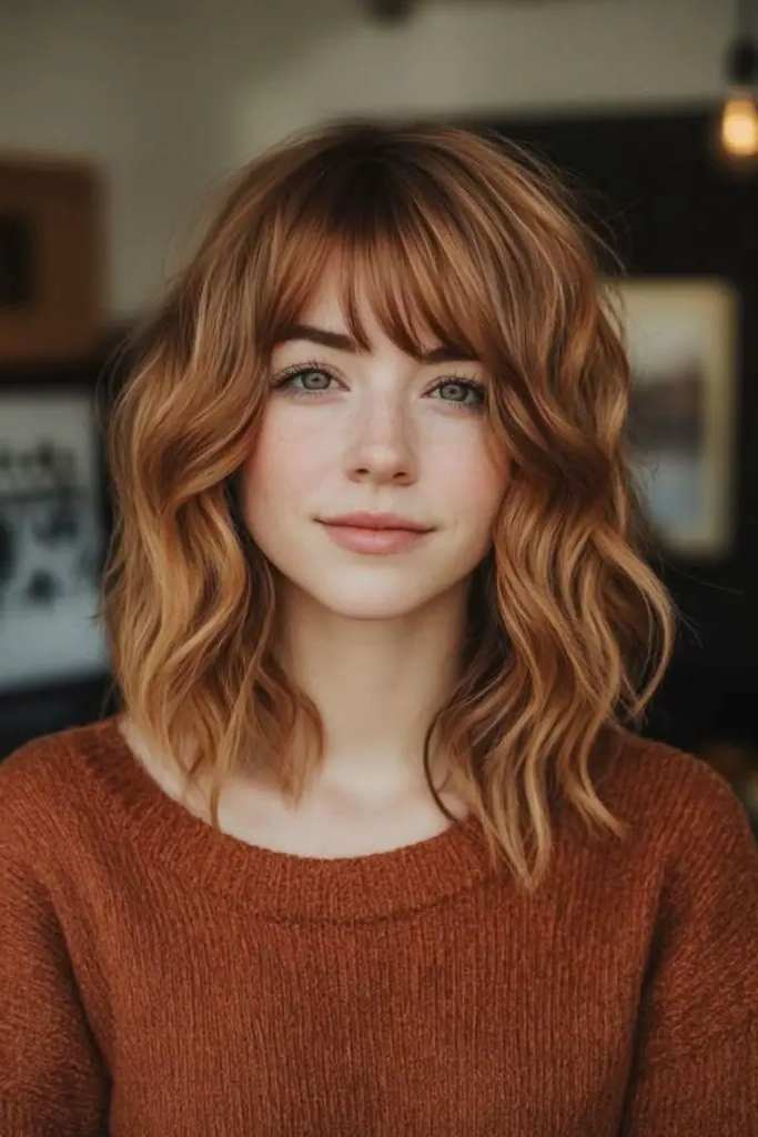 27 Best Lob Haircut with Bangs 5 3. Bohemian Wave Waltz