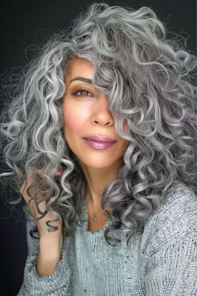 3. Bouncy Curls with Silver Highlights: Effortless and Spirited