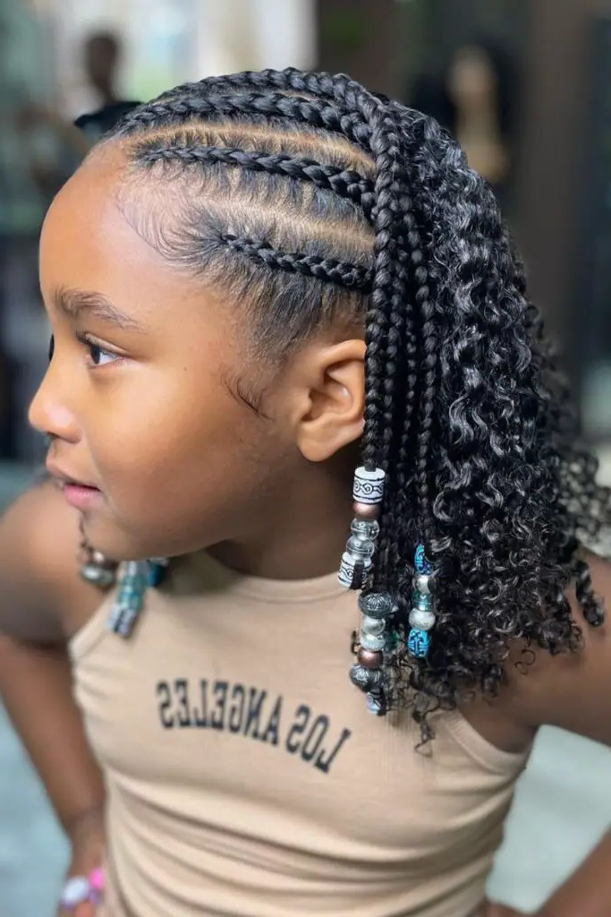 28 Trendy Kids Cornrow Hairstyles 5 3. Twirling Twist Cornrows: Fun and Flirty