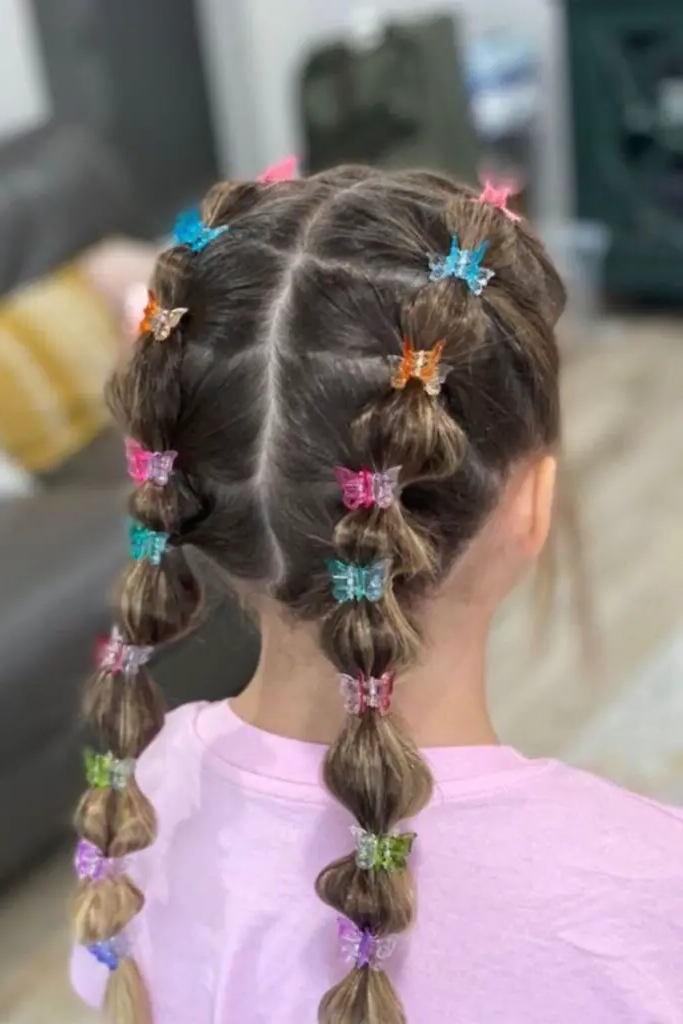 27 Cutest Toddler Beaded Hairstyles for Kids 6 4. Butterfly Beaded Pigtail Charms