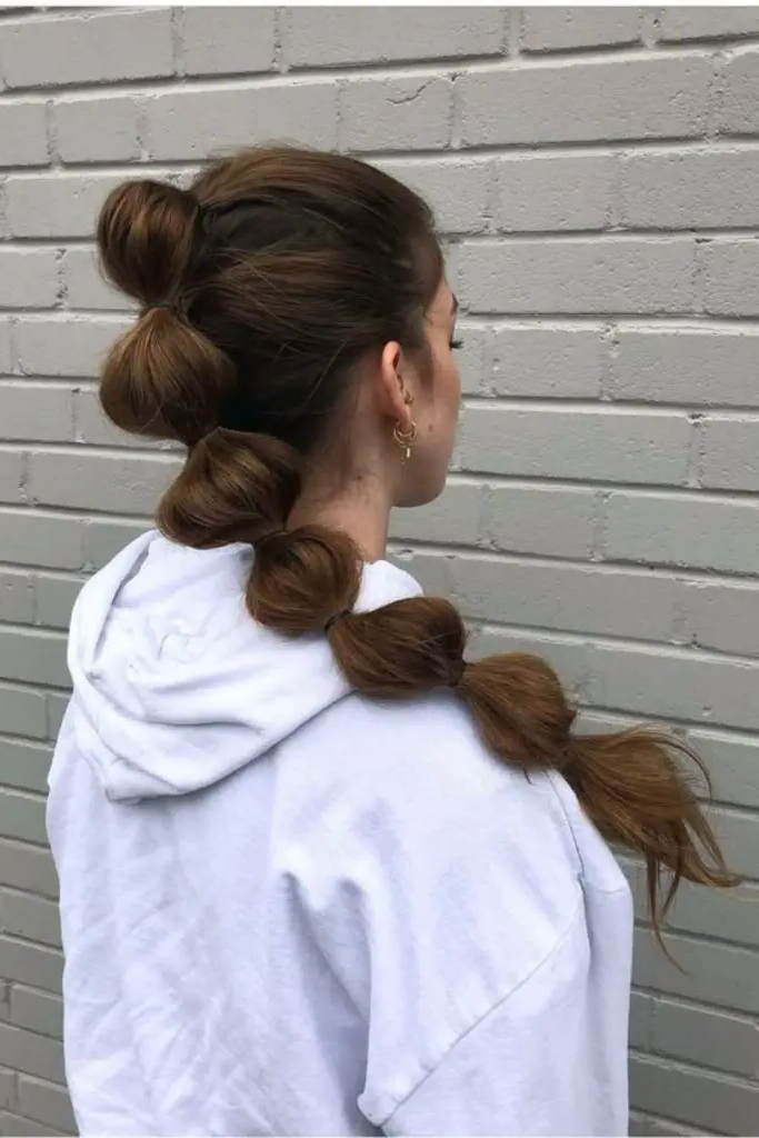 28 Best Volleyball Hairstyles Easy 5 4. High-Speed Bubble Ponytail