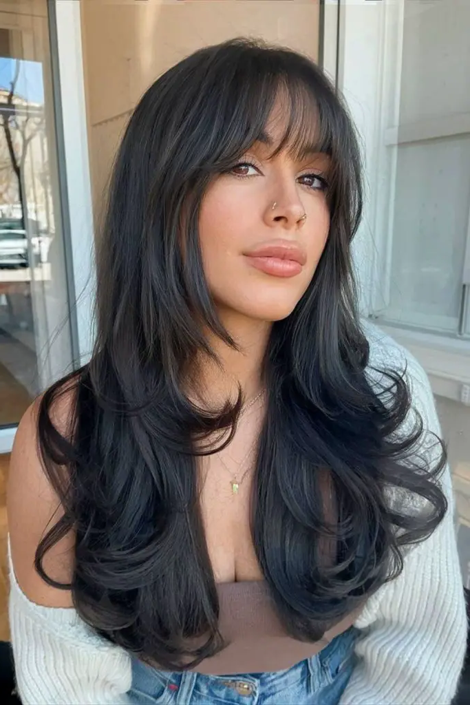 29 Stunning Butterfly Bangs Hairstyles 7 5. Long Butterfly Bangs: Luxurious & Full-Body