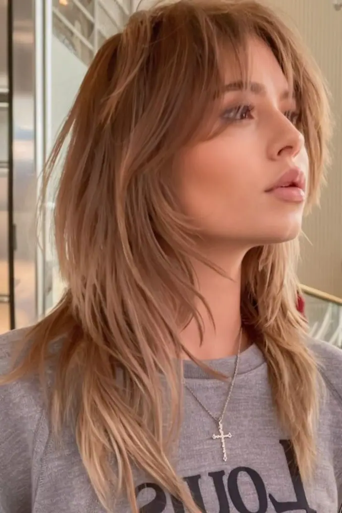 28 Trendy Spring 2025 Hair Trends 7 5. Storm-Tousled Wolf Cut