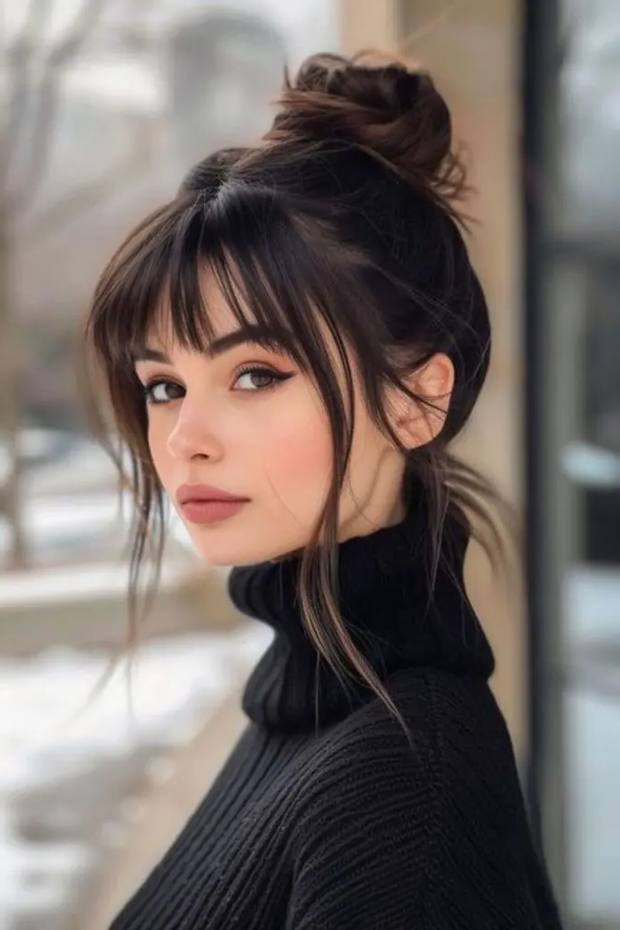 27 Stunning Turtle Neck Hairstyles 10 8. Voluminous Topknot Above High Collars