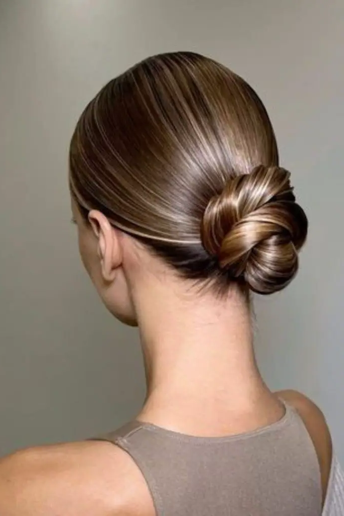 27 Simple Hairstyles for Long Hair 11 9. Sleek Low Bun Luxe