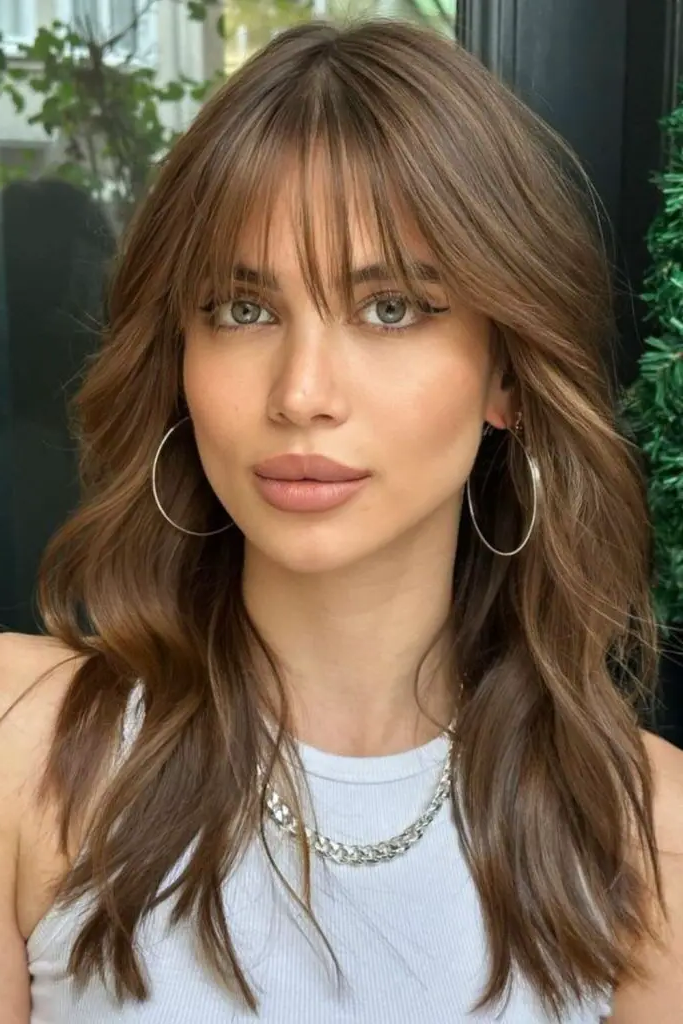 29 Stunning Butterfly Bangs Hairstyles 11 9. Wispy Butterfly Bangs: Gentle and Dreamy