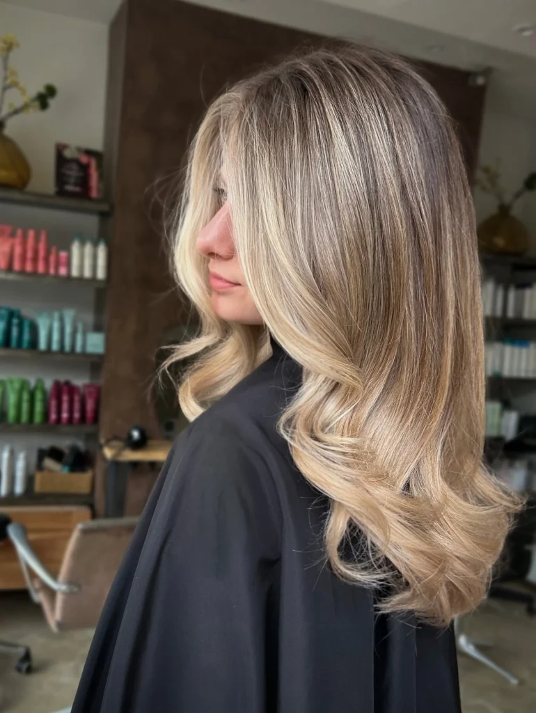 11. Dirty Blonde with Soft Layered Waves Dirty Blonde Hair Color