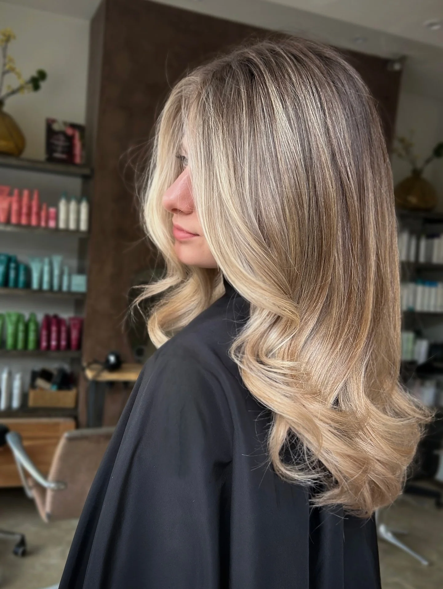 11. Dirty Blonde with Soft Layered Waves Dirty Blonde Hair Color