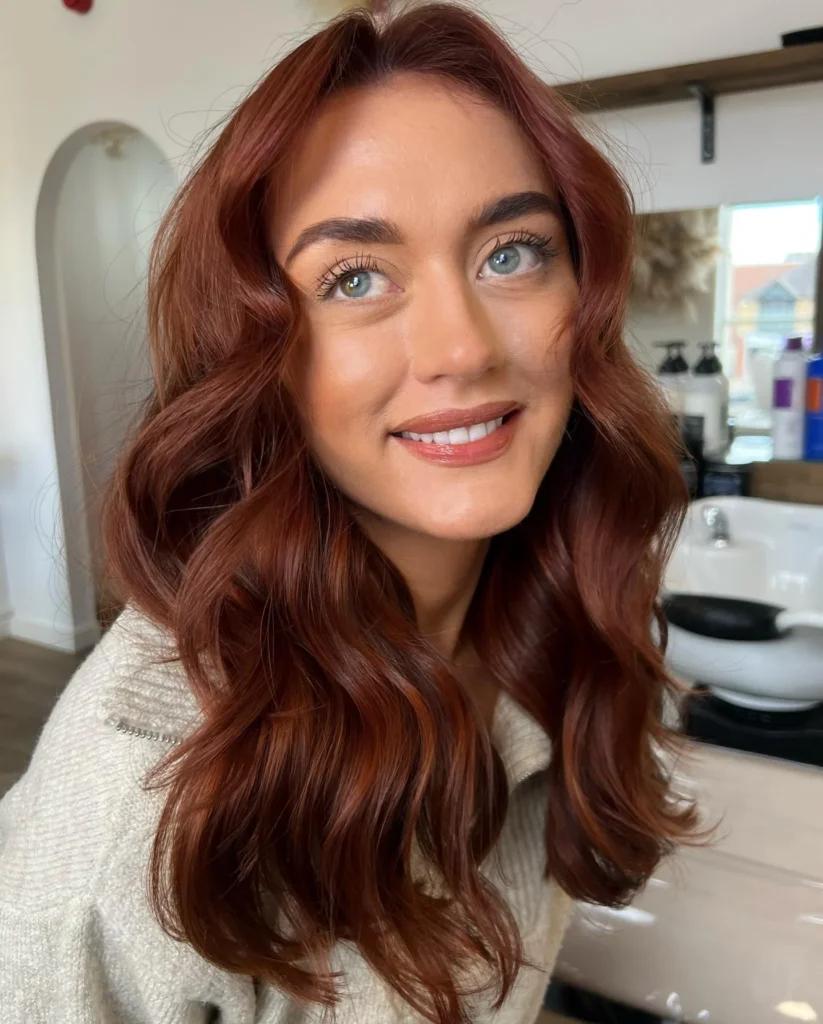 6. Warm Chestnut Waves Auburn Hair Color Ideas for Women