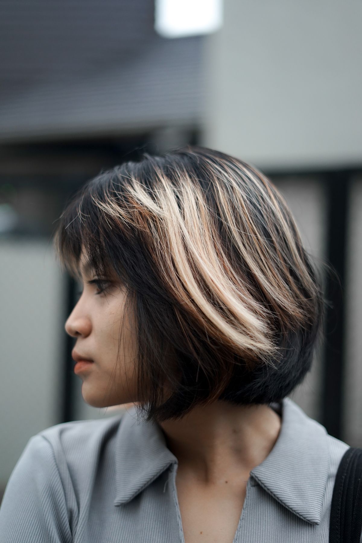 Chocolate Brown Balayage: The Timeless Hair Color Trend for Modern Women 2 Profile portrait of a woman with face-framing hair highlights