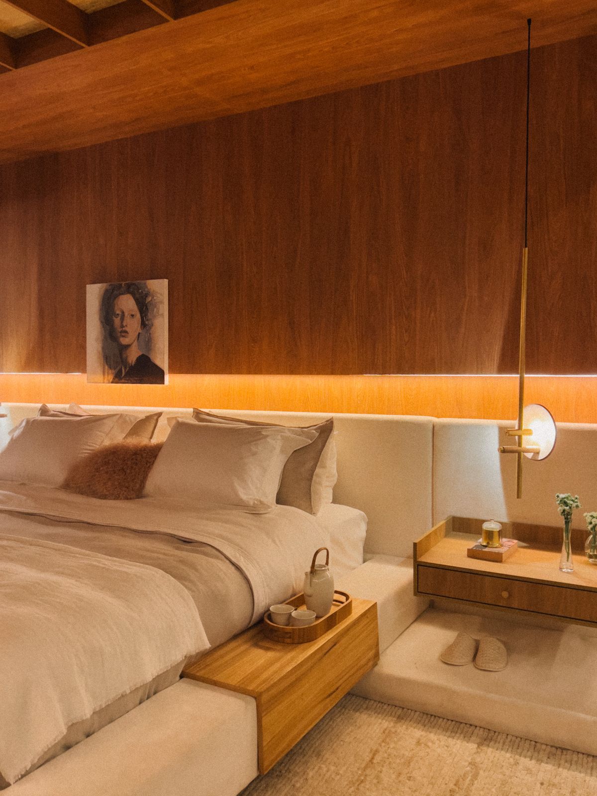 Modern bedroom interior with warm tones and minimalistic design