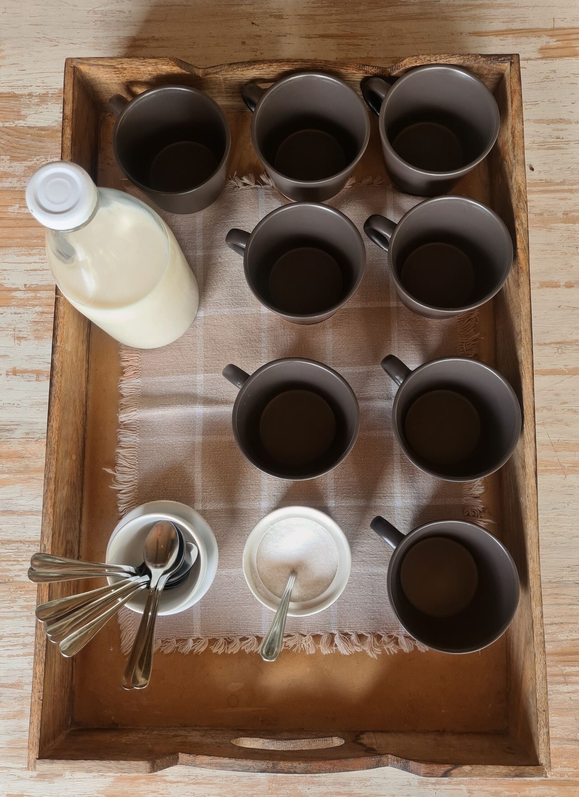 Home Coffee Bar Ideas That Feel Like a Real Café Corner 4 Wooden tray with coffee mugs and milk bottle