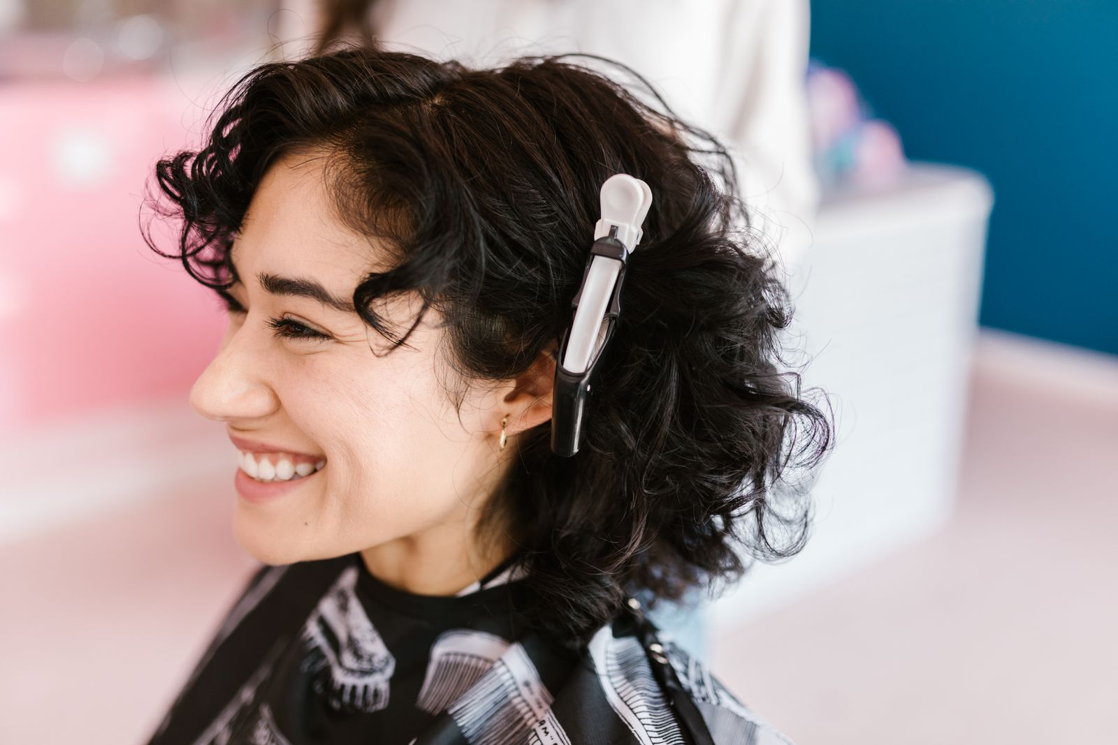 Curly Haircuts: Embracing Natural Beauty with Style and Versatility 2 Woman with a curly bob haircut