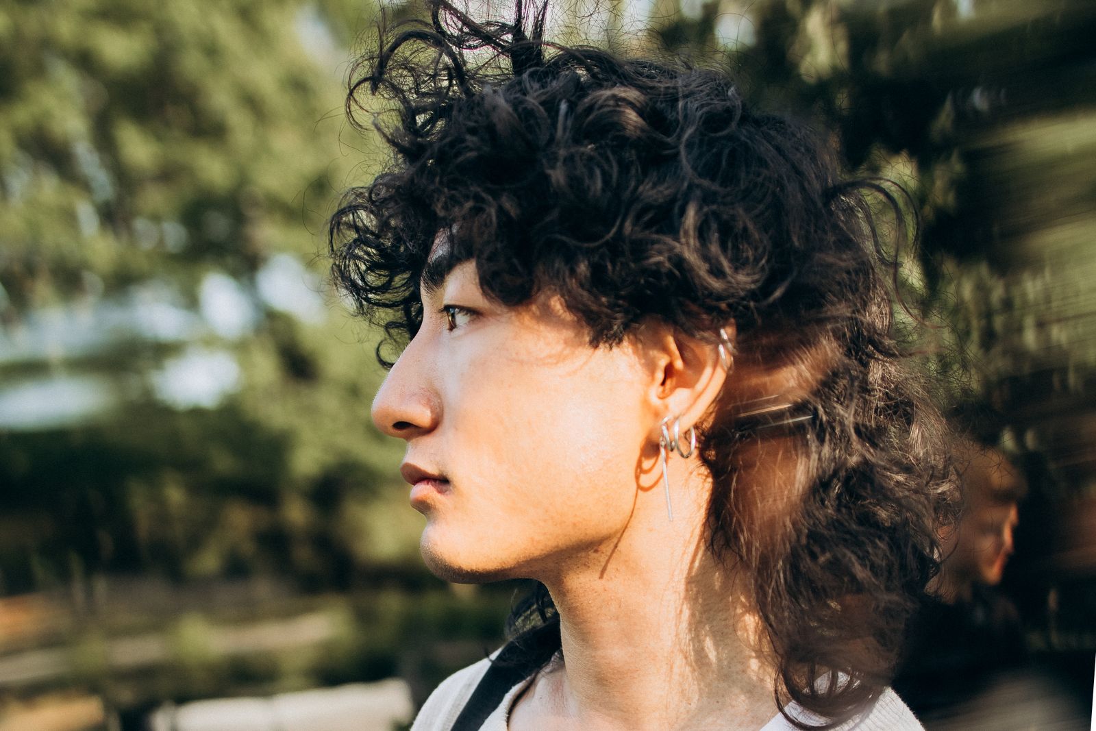 Curly Haircuts: Embracing Natural Beauty with Style and Versatility 7 Woman with a curly mullet haircut