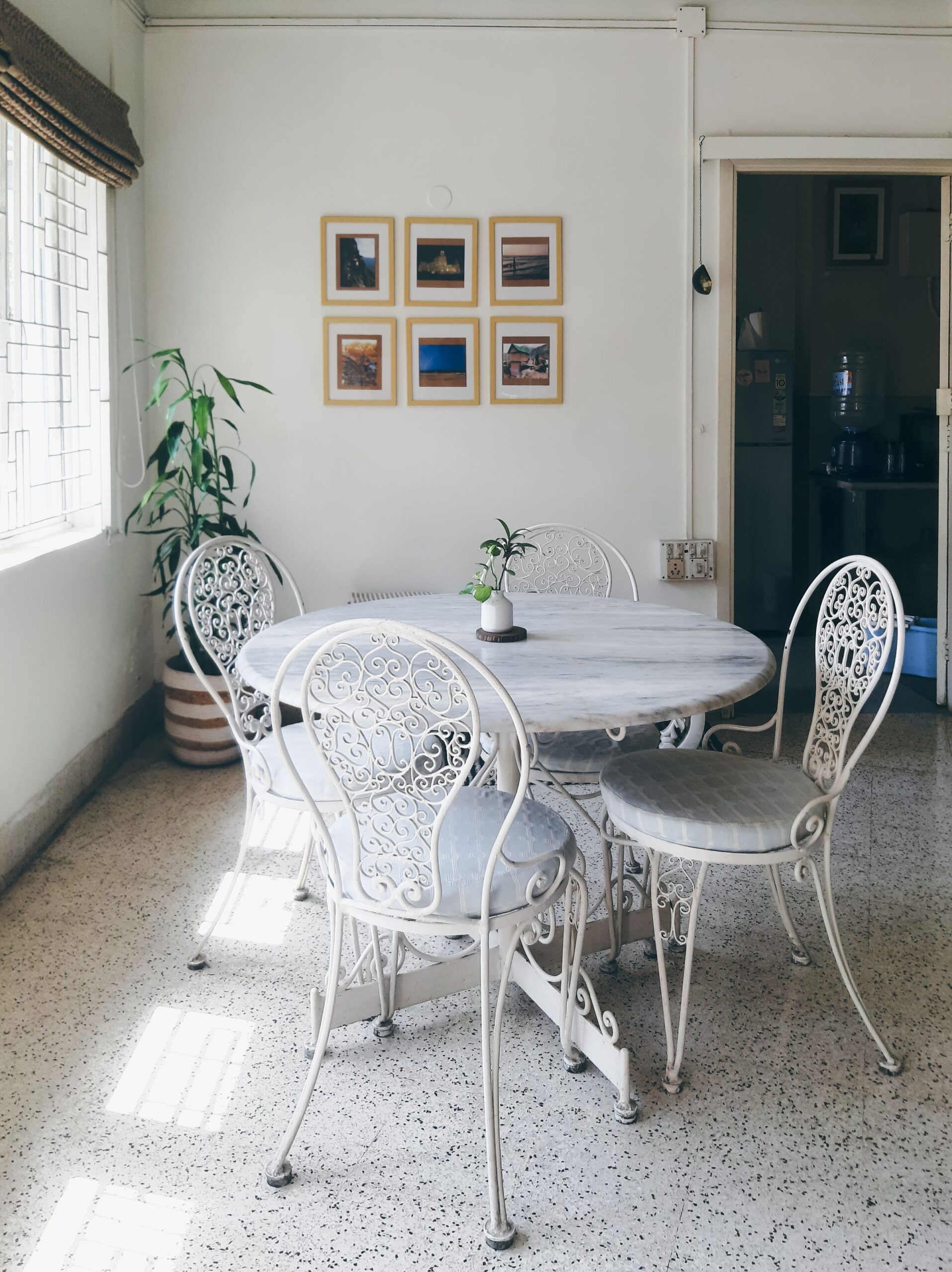 Dining Room Decor Ideas That Make Every Meal Feel Special 7 Dining room wall with a framed gallery wall of photos