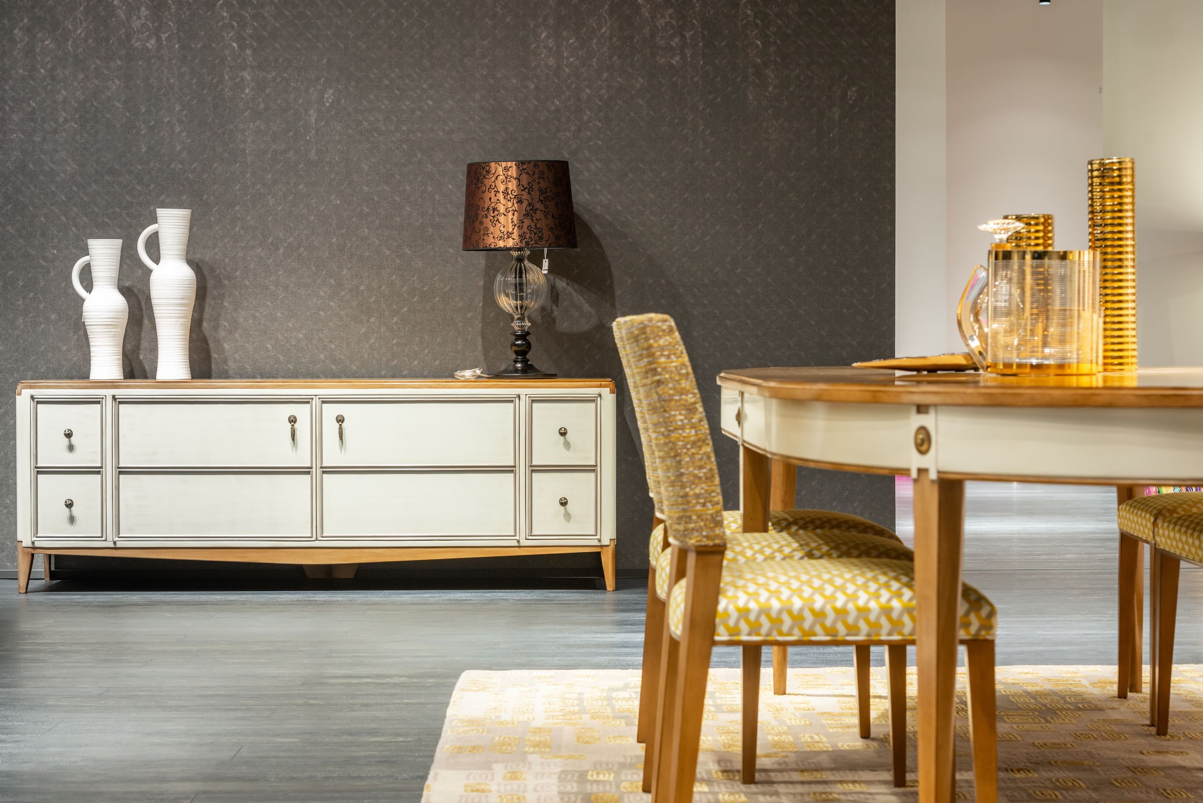 Dining Room Decor Ideas That Make Every Meal Feel Special 6 Elegant white sideboard with lamp and decorative vases