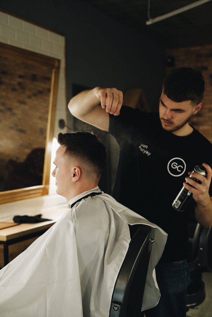 Man getting a fade haircut at the barbershop