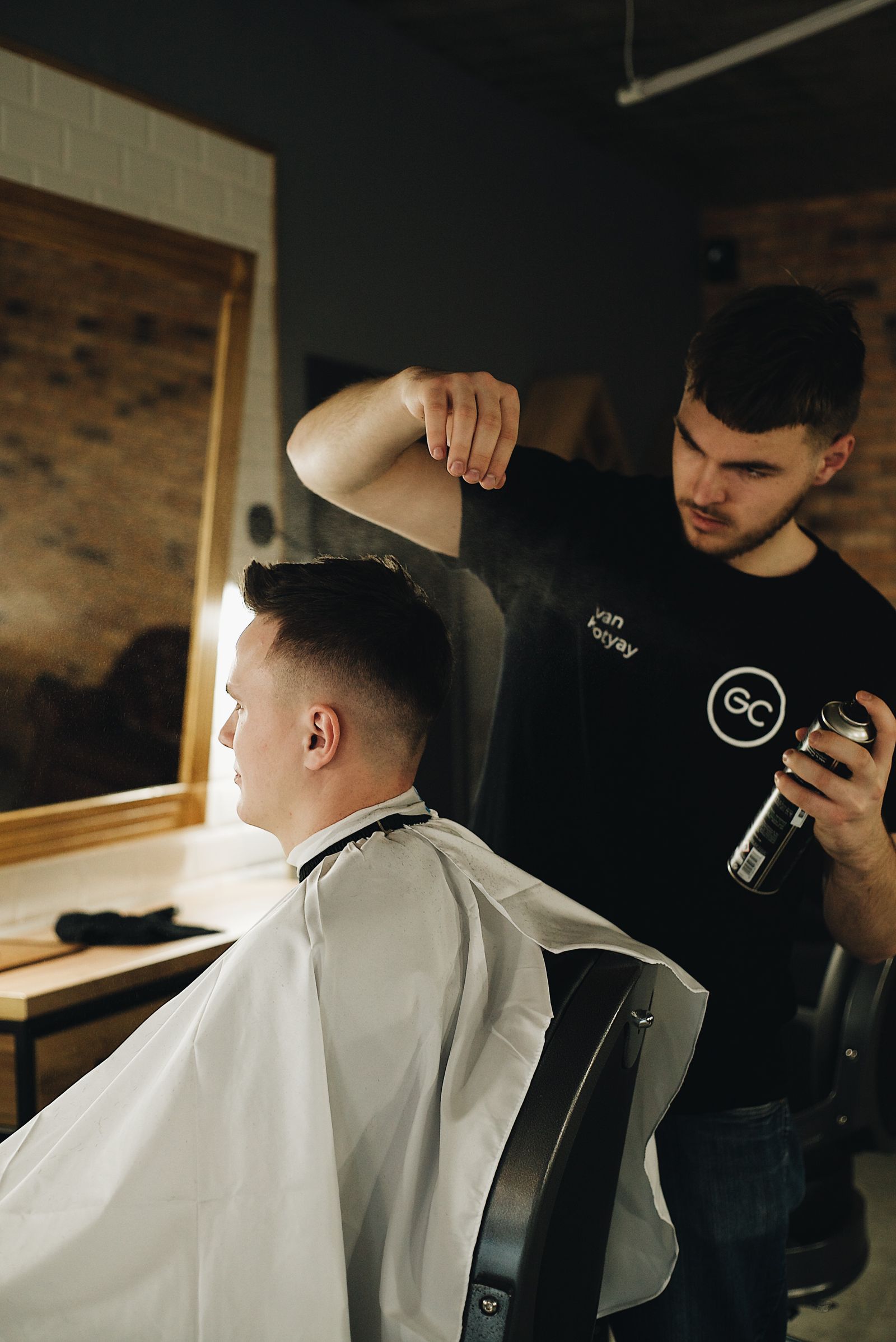 Man getting a fade haircut at the barbershop