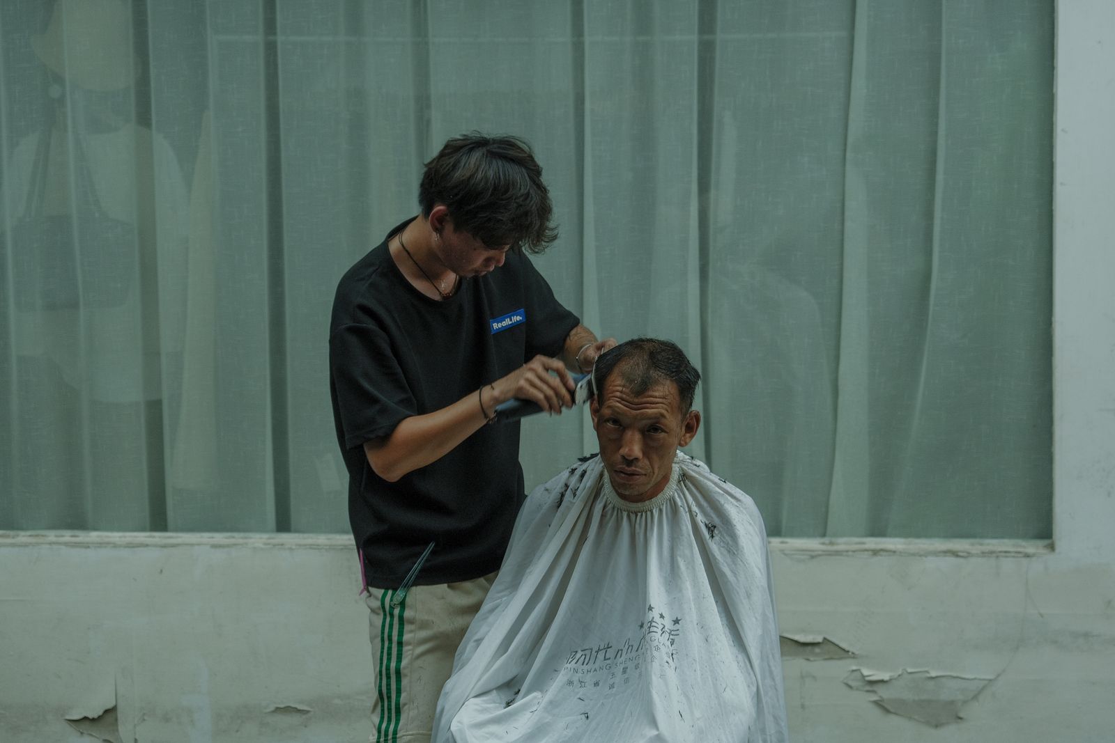 The Fade Haircut: A Modern Classic for Men 4 Man with a high fade haircut and styled top