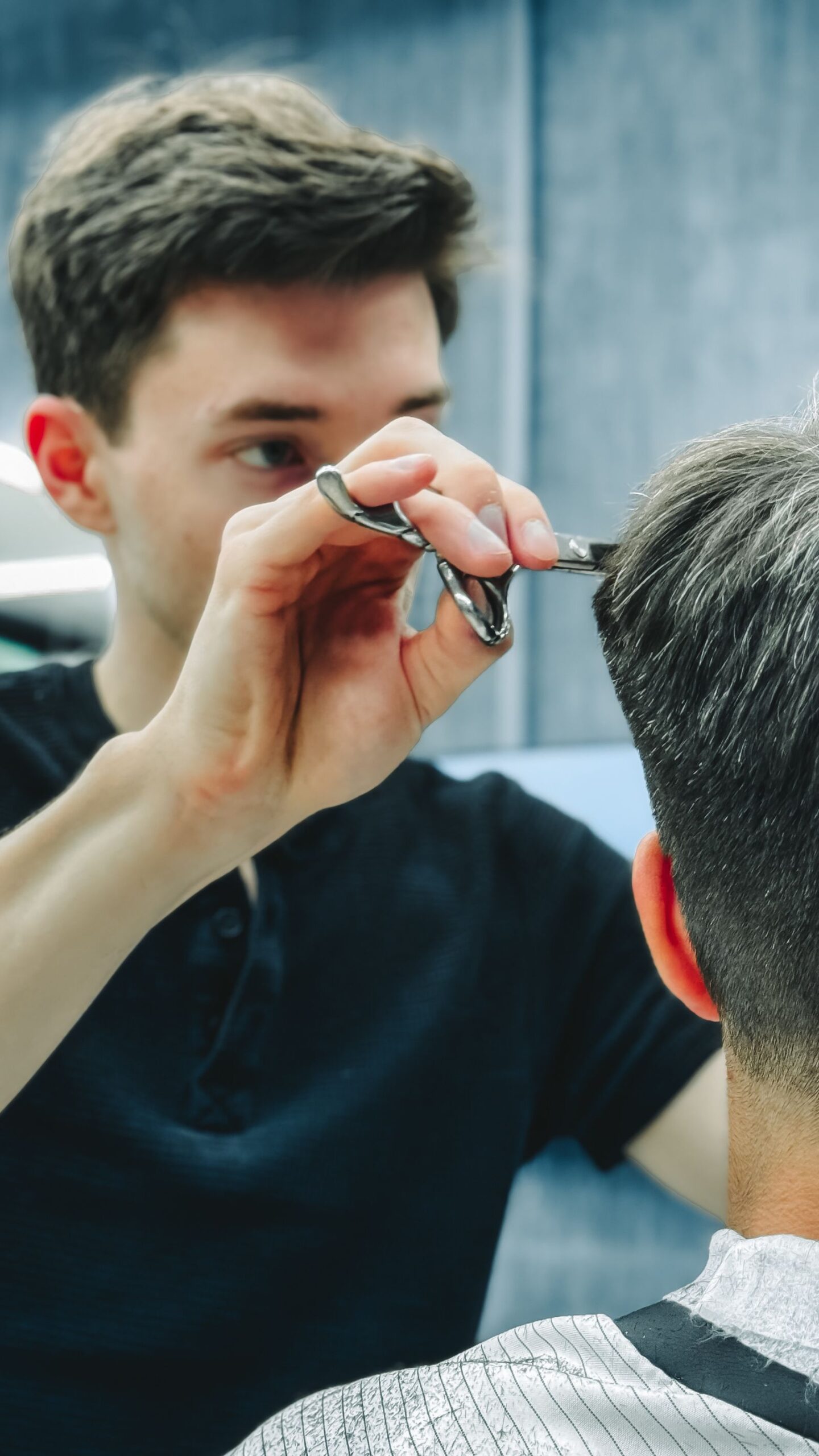The Fade Haircut: A Modern Classic for Men 2 Man with a low and mid fade haircut