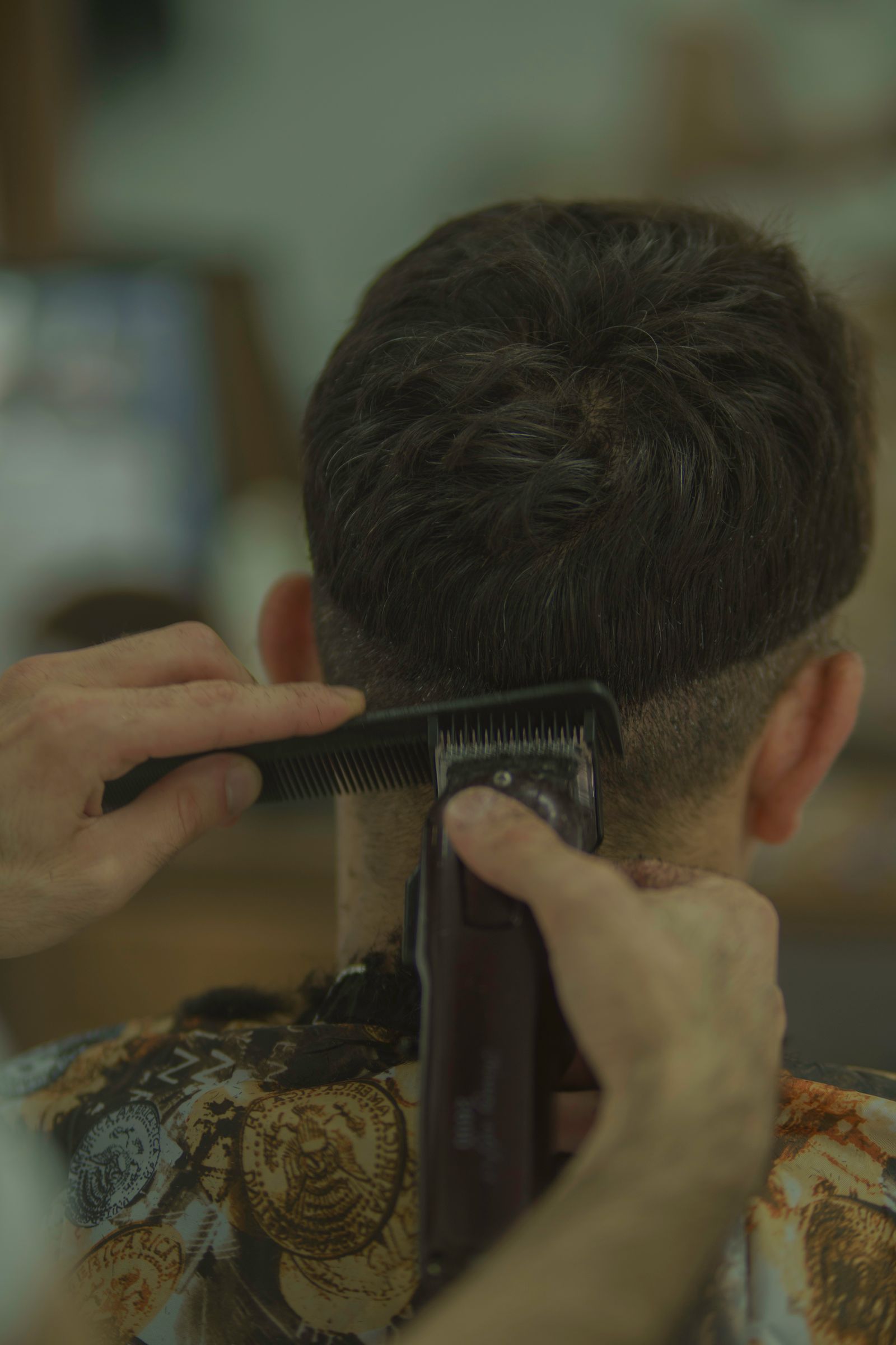 The Fade Haircut: A Modern Classic for Men 3 Man with a skin fade haircut