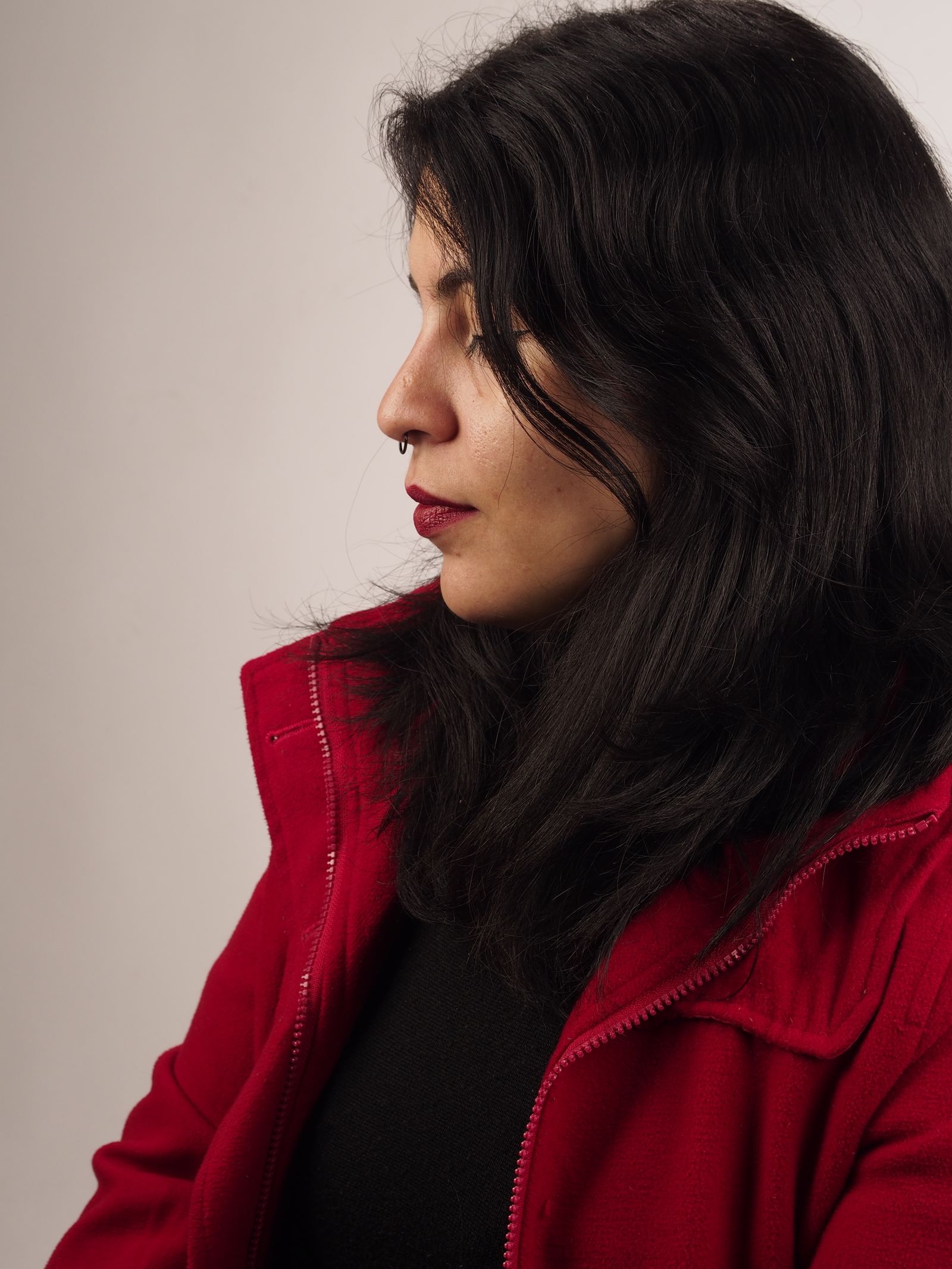The Wolf Cut: A Bold and Trendy Hairstyle for Women 6 Woman with a wolf cut hairstyle showing face-framing layers